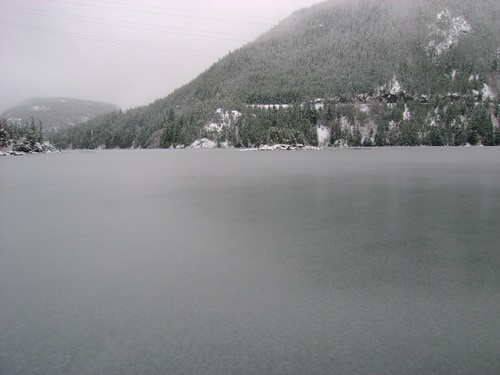 Diablo Lake in April, covered with snow and ice